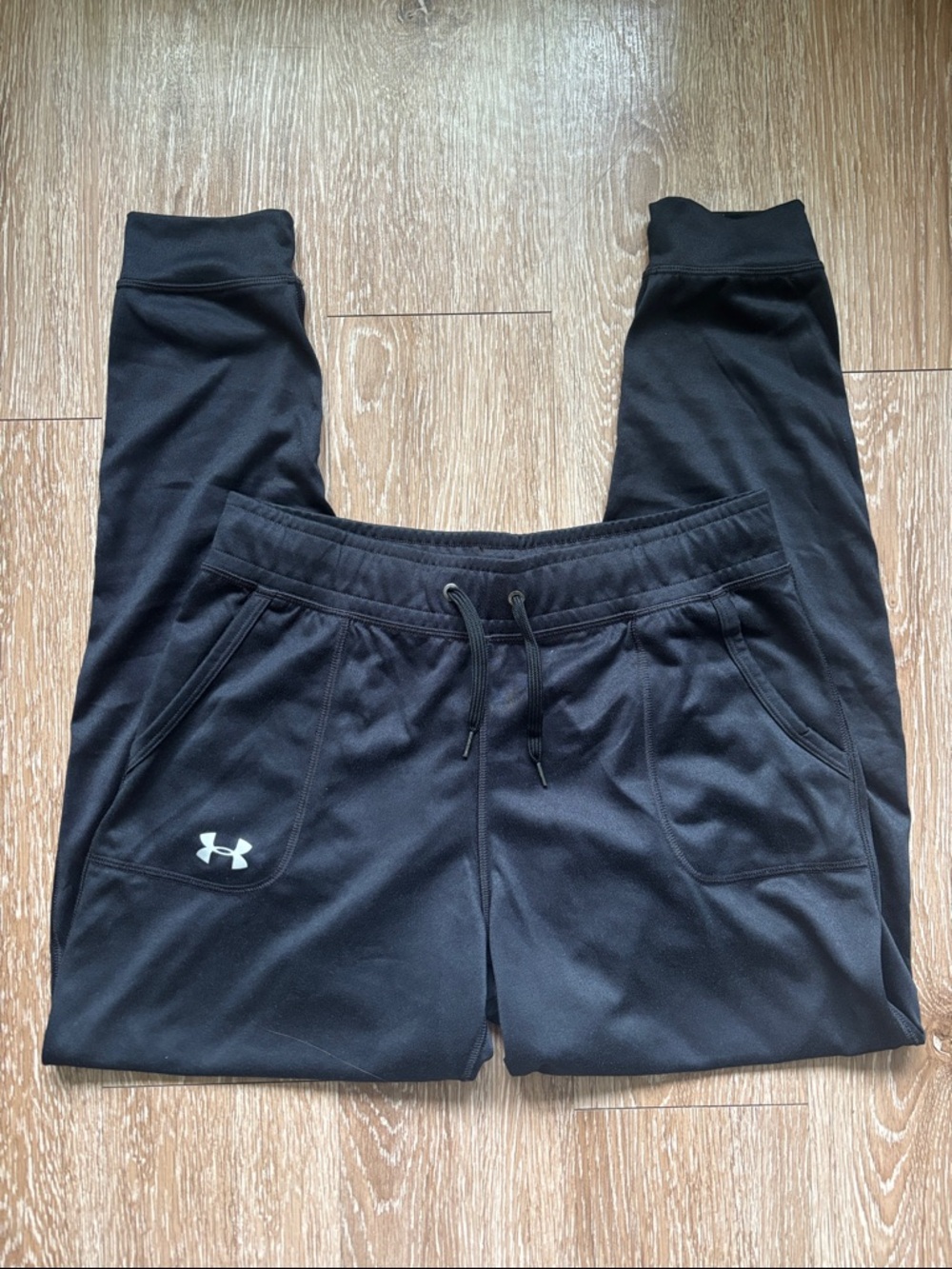 Under Armour women’s black heat gear athletic joggers/track pants, size small